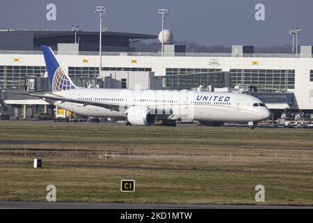 United Airlines Boeing 787-10 Dreamliner aircraft as seen departing from Brussels International Airport Zaventem BRU - Bruxelles Nationaal. The wide body airplane has the registration N17002. The jet plane as seen near the terminal, gates and control tower taxiing and then flying to the United States. United Airlines Inc is a major American airline, the third-largest in the world, member of Star Alliance aviation group, with headquarters in Willis Tower in Chicago Illinois. The aviation industry and passenger traffic are phasing a difficult period with the Covid-19 coronavirus pandemic having  Stock Photo