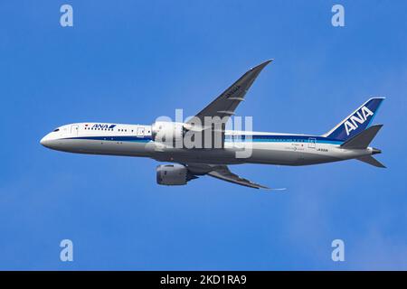 ANA All Nippon Airways Boeing 787 Dreamliner aircraft as seen on final approach flying, doing a go around and then landing at Brussels Airport Zaventem BRU in the blue sky. The arriving from Tokyo passenger plane, a Boeing B787-9 wide body airplane of ANA Air Japan has the registration JA932A. The Japanese airline is member of Star Alliance aviation group with a fleet of 214 jet planes. The aviation industry and passenger traffic are phasing a difficult period with the Covid-19 coronavirus pandemic having a negative impact on the travel business industry with fears of the worsening situation d Stock Photo