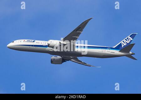 ANA All Nippon Airways Boeing 787 Dreamliner aircraft as seen on final approach flying, doing a go around and then landing at Brussels Airport Zaventem BRU in the blue sky. The arriving from Tokyo passenger plane, a Boeing B787-9 wide body airplane of ANA Air Japan has the registration JA932A. The Japanese airline is member of Star Alliance aviation group with a fleet of 214 jet planes. The aviation industry and passenger traffic are phasing a difficult period with the Covid-19 coronavirus pandemic having a negative impact on the travel business industry with fears of the worsening situation d Stock Photo