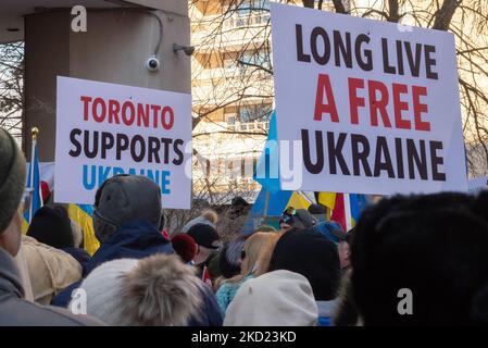 Protestors with placards and Ukrainian flags outside the Russian Consulate demonstrate against the Russian aggression in Ukraine and Russia's intervention in Crimea. About 600 people were on hand to listen to speeches and to hold attention to the Russian military movements. (Photo by Anatoliy Cherkasov/NurPhoto) Stock Photo