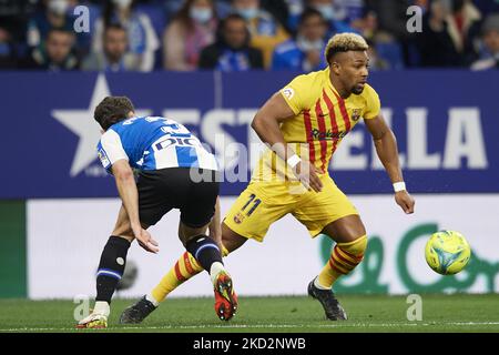 Adama Traore of Barcelona and Adria Pedrosa of Espanyol compete for the ball during the La Liga Santander match between RCD Espanyol and FC Barcelona at RCDE Stadium on February 13, 2022 in Barcelona, Spain. (Photo by Jose Breton/Pics Action/NurPhoto) Stock Photo