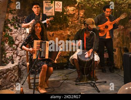 The band Son Malora performing live on Valentine's Day at El Cardenal Cantina in Merida. Son Malora, an independent music project that was born in Chicxulub Puerto, Yucatan in October 2016, unites the influence of each of the four members who represent different musical genres. On Monday, February 14, 2022, in Merida, Yucatan, Mexico. (Photo by Artur Widak/NurPhoto) Stock Photo