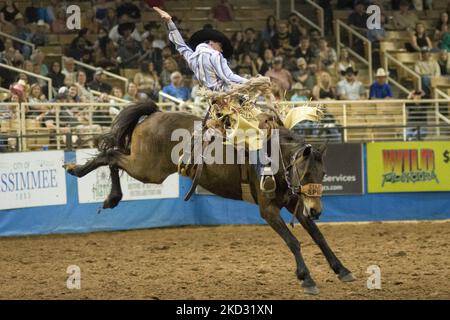 Kade Bruno of Challis, Idaho, USA competes in the Saddle Bronc event at ...