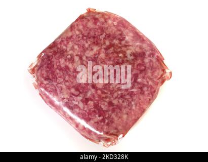 Beef Meat Patty in Vacuum Bags isolated on white Background Stock Photo