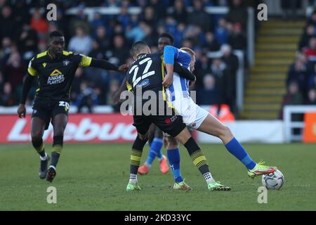 Joe Kizzi of Sutton United battles with Hartlepool United's Marcus Carver during the Sky Bet League 2 match between Hartlepool United and Sutton United at Victoria Park, Hartlepool on Saturday 19th February 2022. (Photo by Mark Fletcher/MI News/NurPhoto) Stock Photo