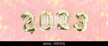 New Year 2023. Foil balloons numbers 2023 on a pink background. New Year Christmas. Stock Photo