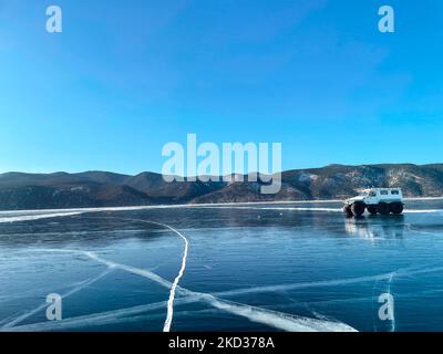 Winter landscape. Baikal Lake. Winter travel on the ice by car. holiday and travel concept Stock Photo