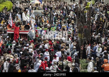 Thousands of muslims held demonstration in front of India Embassy, Jakarta, Indonesia, on February 25, 2022. They protest against the ban of using hijab at schools in India. (Photo by Donal Husni/NurPhoto) Stock Photo