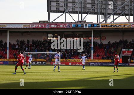 Hartlepool fans are pictured in the away end during the Sky Bet League 2 match between Walsall and Hartlepool United at the Banks' Stadium, Walsall on Saturday 26th February 2022. (Photo by James Holyoak/MI News/NurPhoto) Stock Photo