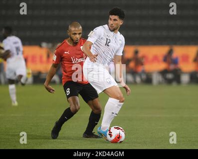 Murad Naji (12) of Al Wakrah on the ball as Yacine Brahimi (8) of Al Rayyan closes in during the Amir Cup quarter final between Al Rayyan and Al Wakrah at the Jassim Bin Hamad Stadium in Doha, Qatar on 5 March 2022. (Photo by Simon Holmes/NurPhoto) Stock Photo