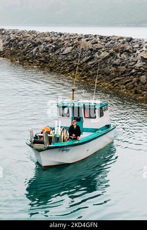 Commercial fishing fishing boat returns to harbor; Whittier; Alaska; USA. Stock Photo