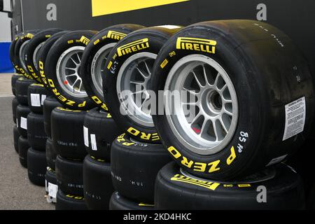 Scarperia, Italy, 21 October 2022 - Yellow Pirelli tires mounted on alloy wheels in the paddock of the Mugello circuit during the ACI CSAI Racing Week Stock Photo