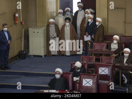 Former Iranian President Hassan Rouhani (Bottom C) attends Iran’s Assembly of Experts’ biannual meeting in the old Iranian Parliament building in Tehran on March 8, 2022. (Photo by Morteza Nikoubazl/NurPhoto) Stock Photo