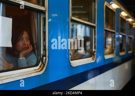 Refugees who arrived from Ukraine are seen inside a train going for the further journey from the main railway station in Krakow, Poland on March 8, 2022. Russian invasion on Ukraine causes a mass exodus of refugees to Poland. (Photo by Beata Zawrzel/NurPhoto) Stock Photo