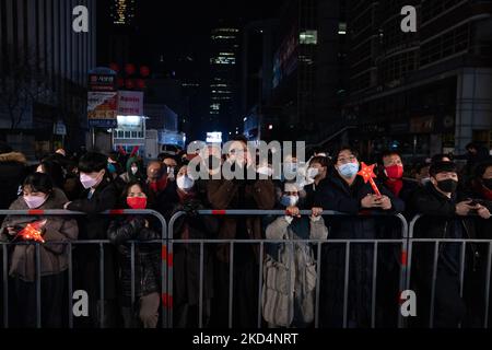 Supporters await Yoon Suk-yeol of the main opposition People Power Party outside party headquarter after declaring win in the presidential election on March 10, 2022 in Seoul, South Korea. (Photo by Chris Jung/NurPhoto) Stock Photo