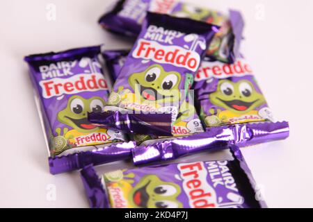 Cadbury Dairy Milk Freddo chocolate bars on white background, bar of chocolate Freddos Stock Photo