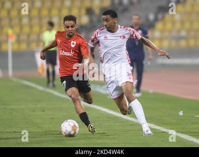 Mohamed El-Sayed (34) of Al Shamal evades a tackle during the QNB Stars  League game between Al Rayyan and Al Shamal at the Suheim bin Hamad Stadium  in Doha, Qatar on 11