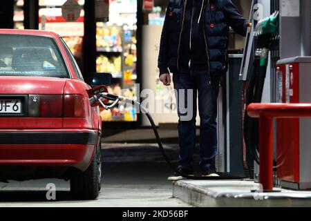 A man is refueling a car at a petrol station in Krakow, Poland on March 14, 2022. (Photo by Jakub Porzycki/NurPhoto) Stock Photo