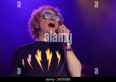 A closeup of Mick Hucknall singing in the live concert of the Simply Red band in Bedford, UK Stock Photo