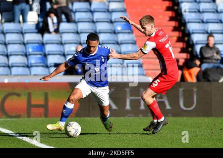 Oldham Athletic's Jordan Clarke tussles with Kieran Phillips during the Sky Bet League 2 match between Oldham Athletic and Exeter City at Boundary Park, Oldham on Saturday 19th March 2022. (Photo by Eddie Garvey/MI News/NurPhoto) Stock Photo