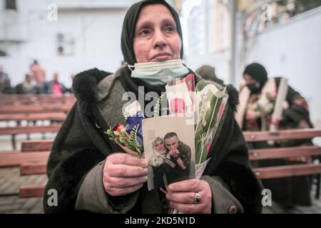 Mothers of Palestinian prisoners carry roses on International Mother's Day during a stand in solidarity with their sons in Israeli prisons(Photo by Momen Faiz/NurPhoto) Stock Photo