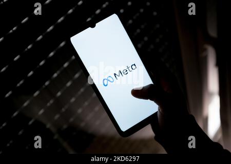 In this photo illustration a Meta logo seen displayed on a smartphone screen in Athens, Greece on March 25, 2022. (Photo by Nikolas Kokovlis/NurPhoto) Stock Photo