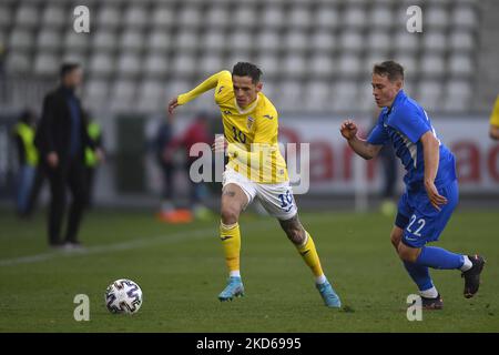 Alexandru Cimpanu and Julius Tauriainen in action during the international friendly match between Romania U21 and Finland U21 at Stadionul Arcul de Triumf on March 25, 2022 in Bucharest, Romania. (Photo by Alex Nicodim/NurPhoto) Stock Photo