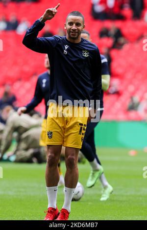 Craig Eastmond of Sutton United warms up during the Papa John Trophy ...