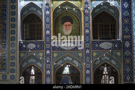 A portrait of Iran’s Supreme Leader Ayatollah Ali Khamenei is pictured at a holy shrine in northern Tehran on the first day of the holy month of Ramadan two years after COVID-19 outbreak in Iran, on April 3, 2022. (Photo by Morteza Nikoubazl/NurPhoto) Stock Photo