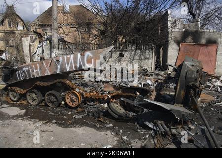 Street with destroyed Russian military machinery in the recaptured by the Ukrainian army Bucha city near Kyiv, Ukraine, 04 April 2022. (Photo by Maxym Marusenko/NurPhoto) Stock Photo