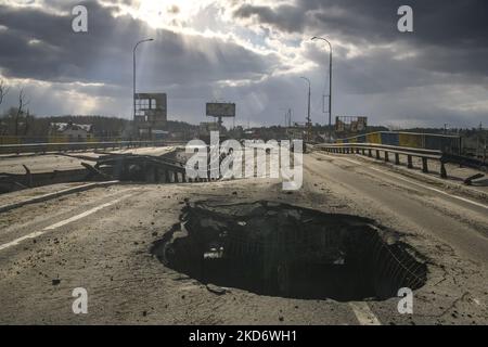 A damaged bridge in the recaptured by the Ukrainian army Bucha city near Kyiv, Ukraine, 04 April 2022. (Photo by Maxym Marusenko/NurPhoto) Stock Photo