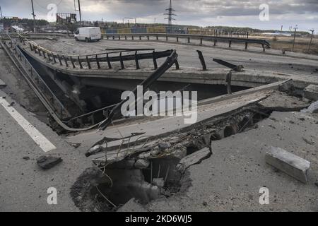 A damaged bridge in the recaptured by the Ukrainian army Bucha city near Kyiv, Ukraine, 04 April 2022. (Photo by Maxym Marusenko/NurPhoto) Stock Photo