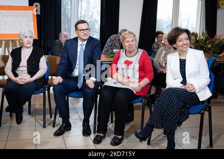 Polish Prime Minister Mateusz Morawiecki and Minister of Family Marlena Malag met with the seniors at Daily Retirement Home in Wola Karczewska, Poland on April 6, 2022 (Photo by Mateusz Wlodarczyk/NurPhoto) Stock Photo