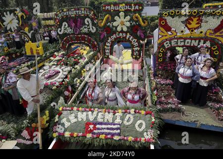 Representatives of La Flor Más Del Ejido in Xochimilco, Mexico City, aboard several canoes decorated with flowers during a tour of the Embarcadero Nuevo de Nativitas on the occasion of this contest, which aims to make visible the diversity of native women of this municipality, as well as to preserve and highlight the origins of the people who still preserve their customs and traditions. (Photo by Gerardo Vieyra/NurPhoto) Stock Photo