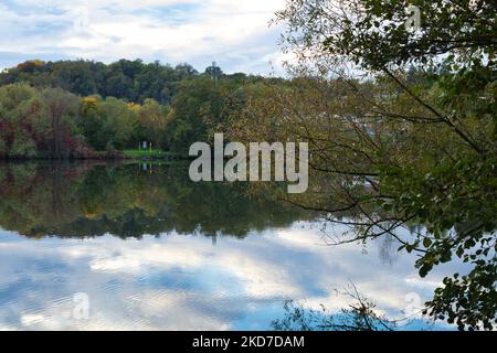 The Shenandoah river state park view with water reflecting trees and cloudy sky Stock Photo