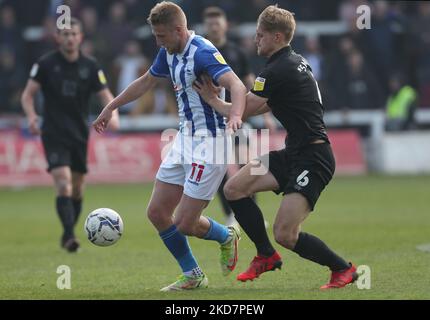 Marcus Carver of Hartlepool United battles for possession with Port Vale's Nathan Smith during the Sky Bet League 2 match between Hartlepool United and Port Vale at Victoria Park, Hartlepool on Friday 15th April 2022. (Photo by Mark Fletcher/MI News/NurPhoto) Stock Photo