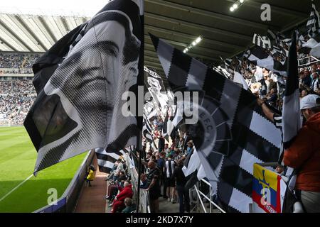 Newcastle United's fans wave flags provided by supporters group 'Wor Flags' before the kick off the Premier League match between Newcastle United and Leicester City at St. James's Park, Newcastle on Sunday 17th April 2022. (Photo by Mark Fletcher/MI News/NurPhoto) Stock Photo