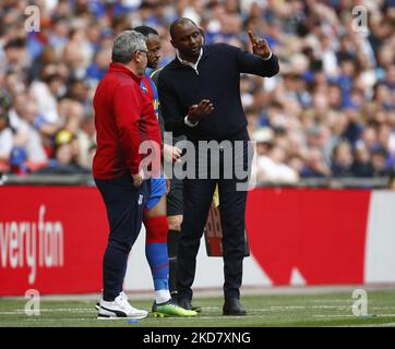 Crystal Palace manager Patrick Vieira give final instructions to Crystal Palace's Jordan Ayew before going on during FA Cup Semi-Final between Crystal Palace and Chelsea at Wembley Stadium , London, UK 17th April , 2022 (Photo by Action Foto Sport/NurPhoto) Stock Photo