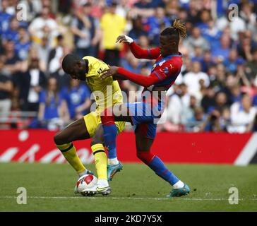 Chelsea's Antonio Rudiger tussle with Crystal Palace's Wilfried Zaha during FA Cup Semi-Final between Crystal Palace and Chelsea at Wembley Stadium , London, UK 17th April , 2022 (Photo by Action Foto Sport/NurPhoto) Stock Photo