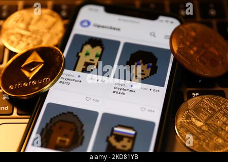 CryptoPunks collection in OpenSea displayed on a phone screen and NFT ...