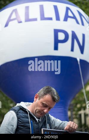 Fabien Vanhemelryck, secretary general of the Alliance Police Nationale union, speaks at a police demonstration in Paris on May 2, 2022 to protest against the indictment for 'voluntary manslaughter' of the French police officer who killed two men who allegedly forced a checkpoint on the Pont-Neuf in Paris on April 24, 2022. The call for the rally was initiated by the Alliance Police Nationale union, which was joined by the Synergie officers' union and Unsa-Police. (Photo by Samuel Boivin/NurPhoto) Stock Photo