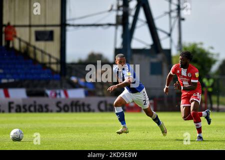 Oldham Athletic's Jordan Clarke tussles with Aramide Oteh of Crawley Town Football Club during the Sky Bet League 2 match between Oldham Athletic and Crawley Town at Boundary Park, Oldham on Saturday 7th May 2022. (Photo by Eddie Garvey/MI News/NurPhoto) Stock Photo