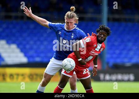 Oldham Athletic's Carl Piergianni tussles with Aramide Oteh of Crawley Town Football Club during the Sky Bet League 2 match between Oldham Athletic and Crawley Town at Boundary Park, Oldham on Saturday 7th May 2022. (Photo by Eddie Garvey/MI News/NurPhoto) Stock Photo