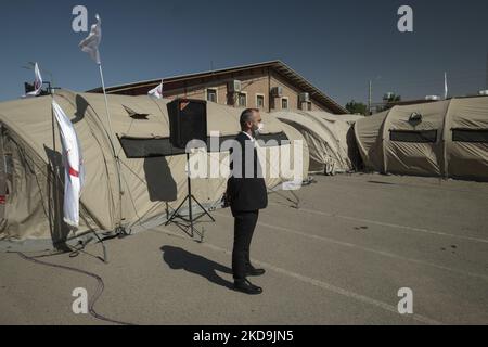 Deputy Director General of the Turkish Red Crescent, Alper Kucuk, stands next to a mobile hospital while attending a ceremony to mark the 100th anniversary of the founding of the Iranian Red Crescent Society, in southern Tehran on May 9, 2022. (Photo by Morteza Nikoubazl/NurPhoto) Stock Photo