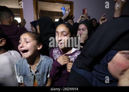 Mourners react on May 11, 2022, during the funeral in Khan Younis in the southern Gaza strip, of Palestinian Mahmud Eram, who was shot and killed by Israeli forces near a military checkpoint, south of Tulkarem in the northern West Bank on May 8. - Aram was shot and killed by Israeli forces' fire near the military checkpoint as he tried to enter Israel through the Jewish state's barrier in the north of the occupied West Bank. (Photo by Majdi Fathi/NurPhoto) Stock Photo