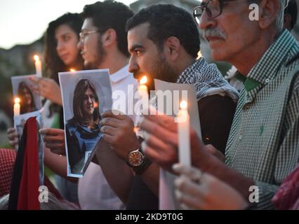 People take part in a candelight vigil outside the UN ESCWA building to denounce the killing of Al Jazeera reporter Shireen Abu Akleh, in Beirut, Lebanon, on May 12, 2022. Abu Akleh, 51, a prominent figure in the Arabic news service of Al-Jazeera channel, was shot dead on 11 May during a confrontation between Israeli soldiers and Palestinians in the West Bank city of Jenin. (Photo by Fadel Itani/NurPhoto) Stock Photo