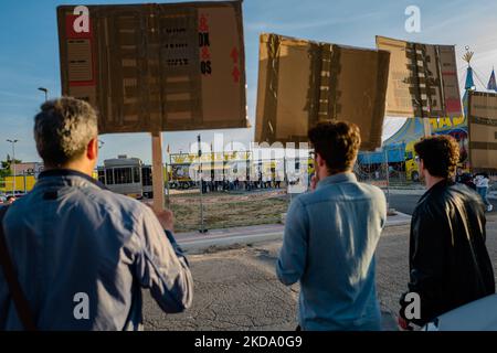 Volunteers show signs during the protest against the exploitation of animals in the Orfei circus of Molfetta on May 14, 2022. Sit-in protest against the exploitation of animals in entertainment shows, near the settlement area of ??the Orfei circus, currently present in the city of Molfetta. The garrison involved a group of citizens of Molfetta, led by the volunteers of the animal rights association 'Lo Stregatto - Molfetta'(Photo by Davide Pischettola/NurPhoto) Stock Photo