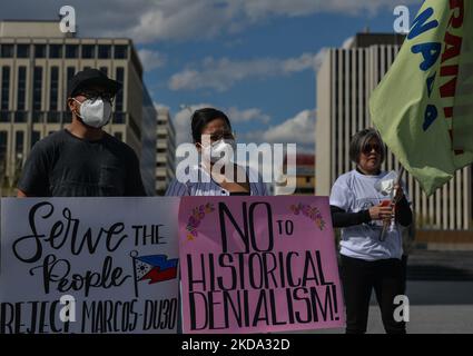 Members of the local Filipino youth diaspora (Anakbayan Alberta) protest outside the Alberta Legislature in Edmonton, calling out the Commission on Elections (COMELEC) in Philippines for their negligence and failure to uphold honest and fair elections last May 9, 2022. The organisers of the protest said: 'We condemn another political dynasty with the Marcos-Duterte tandem that continues the fascist regime among the Filipinos'. On Sunday, May 15, 2022, in Edmonton, Alberta, Canada. (Photo by Artur Widak/NurPhoto) Stock Photo