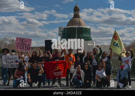 Members of the local Filipino youth diaspora (Anakbayan Alberta) protest outside the Alberta Legislature in Edmonton, calling out the Commission on Elections (COMELEC) in Philippines for their negligence and failure to uphold honest and fair elections last May 9, 2022. The organisers of the protest said: 'We condemn another political dynasty with the Marcos-Duterte tandem that continues the fascist regime among the Filipinos'. On Sunday, May 15, 2022, in Edmonton, Alberta, Canada. (Photo by Artur Widak/NurPhoto) Stock Photo