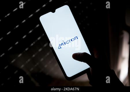 In this photo illustration a Micron logo seen displayed on a smartphone screen in Athens, Greece on May 16, 2022. (Photo illustration by Nikolas Kokovlis/NurPhoto) Stock Photo